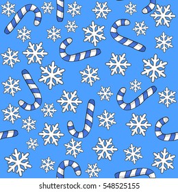 Christmas pattern with snowflakes, candy on a blue background.Happy New Year