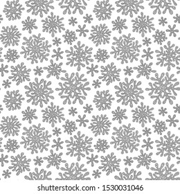 Christmas pattern from snowflakes for a card. Pattern for coloring book. Christmas hand-drawn doodle decorative elements. Black and white pattern.