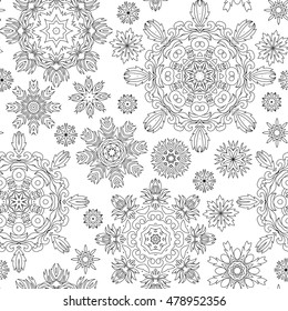 Christmas pattern from snowflakes for a card vector. Pattern for coloring book. Christmas hand-drawn doodle decorative elements in vector. Black and white pattern.