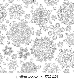 Christmas pattern from snowflakes for a card vector. Pattern for coloring book. Hand-drawn doodle decorative elements in vector. Black and white pattern. Coloring book page.