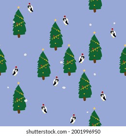 Christmas pattern with Christmas trees, penguins on the grass.