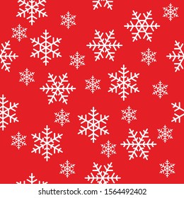 Christmas pattern with white snowflakes on red background. Seamless Christmas pattern