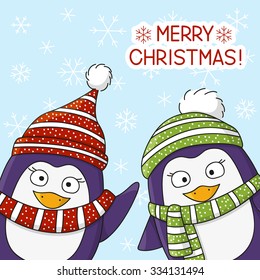 Christmas penguins on snow background