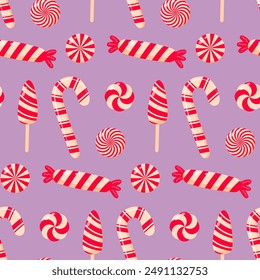 Christmas peppermint swirl candies, candy cane, lollipops seamless pattern. Christmas peppermint swirl candies seamless pattern.