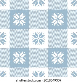 Christmas plaid pattern with nordic pixel snowflakes and herringbone tartan plaid in light blue and white. Seamless buffalo check vichy graphic for New Year festive flannel shirt, scarf, tablecloth.