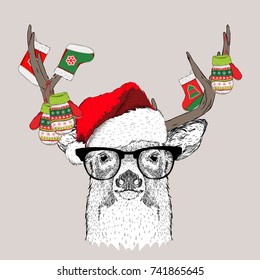 The christmas poster with the image deer portrait in Santa's hat and with a socks and gloves on the horns. Vector illustration.