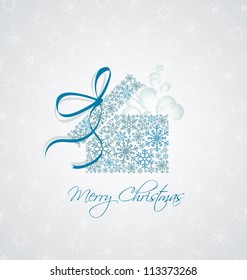 Christmas present box on snowy background