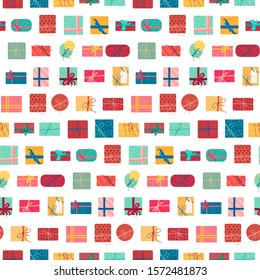 Christmas present boxes with ribbons seamless pattern. New year background. Xmas wallpaper