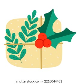 Christmas present with Holly and twigs. Christmas leaves, traditional plant. The box is tied with ribbon. Green leaves and red berries. Symbol of the New Year. Design for cards, stickers, icons, decor