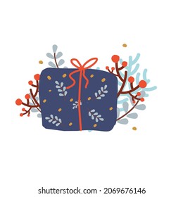 Christmas present. New Year giftbox decorated with spruce, berries, forest branches, leaves for seasonal winter celebration design