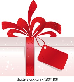 Christmas Present with  red bow and tag