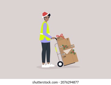 Christmas presents delivery, a young male storage worker wearing a high visibility yellow vest and a red Santa hat