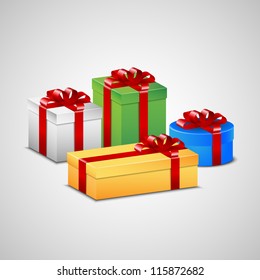 Christmas presents in white, green, blue and yellow color with red ribbon and bow.