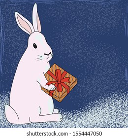 Christmas rabbit with gifts in box on a background of snow. Template for greeting card for Christmas and Nova Year. Pink rabbit on a blue background in a flat style, vector.