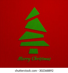 Christmas red background with a green Christmas tree, from simple triangles, flat style, with realistic vector imitation craft paper. Vector illustration.