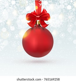 Christmas red ball hanging with ribbon and a bow, on winter background with snow and snowflakes. Merry Christmas and Happy New Year 2018. Greeting card template. EPS10.Vector illustration.