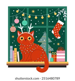 Christmas red cat wrapped in garland with deer antlers on head sits at window with holidays decorations, gifts and festive candles. Merry Christmas and Happy New Year scene with cat on windowsill.