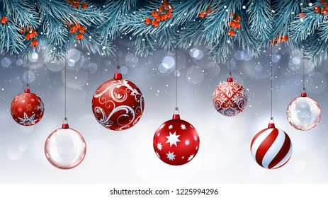 Christmas red decorations with blue fir branches