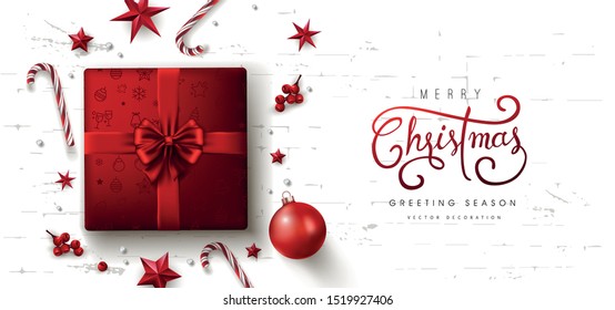 Christmas red Decorative Border made of Festive Elements Background. Merry Christmas vector text Calligraphic Lettering Vector illustration. Presents on white background top view. 