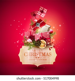 Christmas red gift boxes, baubles and paper label on red background - Luxury Christmas greeting card