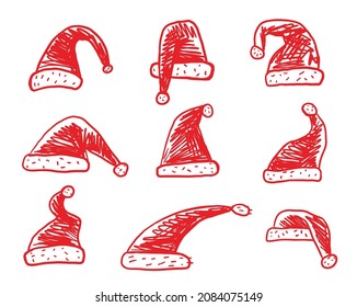 Christmas red hat of Santa Claus sketch set. TChristmas and New Year festive design.