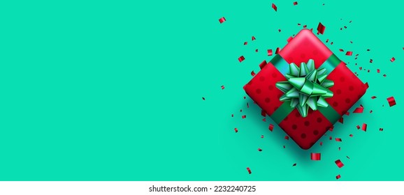 Christmas red polka dot gift box on green background. New Year presents. Space for text. Vector holiday illustration.