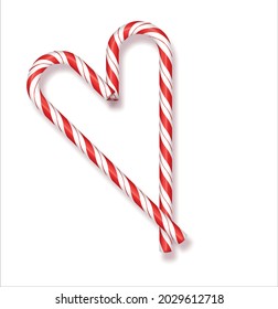 Christmas red and white lollipops on a white background lined in the shape of Christmas hearts and Valentine's Day gift