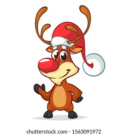 Christmas reindeer in Santa Claus hat and jingle bells collar pointing hand. Vector illustration isolated