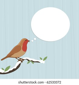 christmas robin red breast perched on branch with speech bubble ready for text