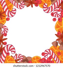 Christmas round frame with candies, berries, oranges, nuts and spice