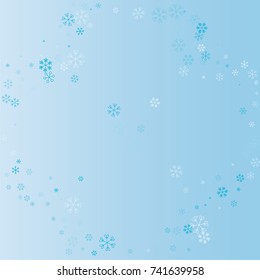 Christmas rounded border or frame with random scatter falling blue snowflakes on a blue background.