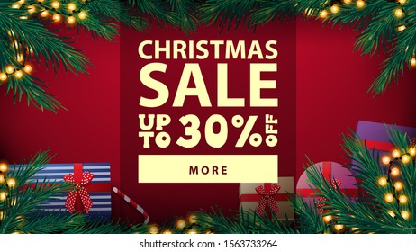 Christmas sale, up to 30% off, beautiful red discount banner with Christmas tree frame with yellow bulb garland and presents, top view