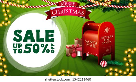 Christmas sale, up to 50% off, green discount banner for website with garlands, logo with ribbon, Christmas tree branches and Santa letterbox with presents