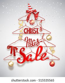 Christmas sale banner with abstract christmas tree made from hangers with decorations