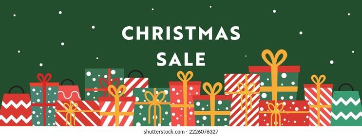 Christmas sale banner ad template with gifts and presents lined up (green)