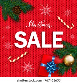 Christmas sale banner with box gifts with bow, candy cane, bubble  on red knitted background. Christmas ornament decorations. Vector calligraphy lettering 