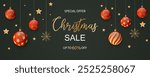 Christmas sale banner with festive ornaments and fir branches