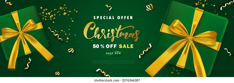 Christmas sale banner with gifts with golden bows , 50% discount on a green background.