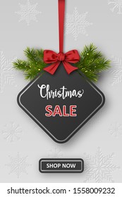 Christmas Sale banner with realistic pine branches and red ribbon. Vector illustration