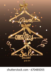 Christmas Sale banner with sparkling gold serpentine and gold hangers. Vector illustration