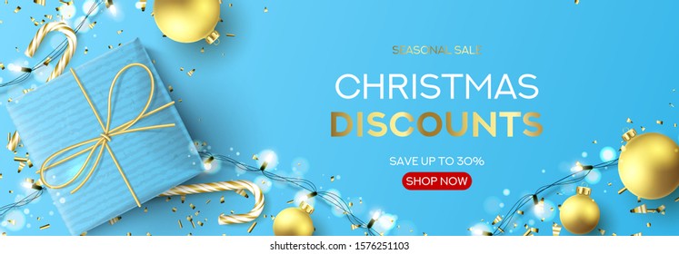 Christmas sale banner template. Holiday background with blue gift box, light garlands, Christmas golden balls, confetti and candy canes. Vector illustration. Happy New Year poster.