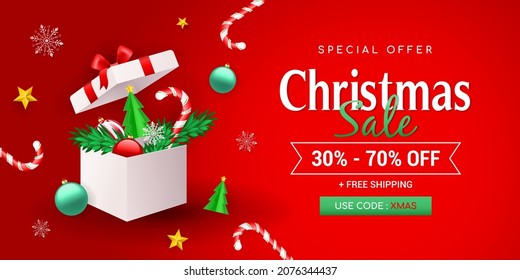 Christmas sale banner vector illustration. Open gift box with Christmas ornament on red background