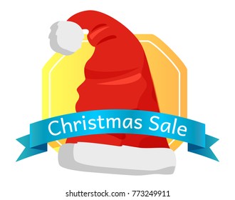 Christmas sale emblem Santas hat with pompom in cartoon style, bue ribbon with text, vector illustration shopping winter holidays label on white