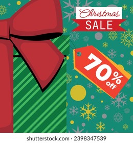 Christmas Sale Green Gift Box With Red Ribbon With Tag 70% Off and Gold Silver Snowflakes and Balls in Background