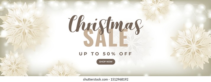 Christmas Sale header or banner design with 50% discount offer, paper cut snowflakes and lighting garland decorated on background.