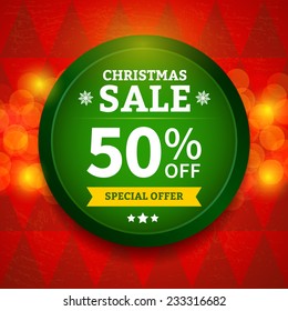 Christmas sale label on a red background with bokeh