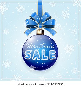 Christmas sale on blue Christmas balls with bow and snowflakes, illustration.
