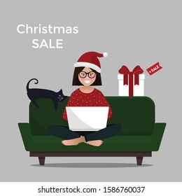 Christmas sale. Online shopping. Happy girl sitting on sofa with laptop and making orders online. Vector illustration.