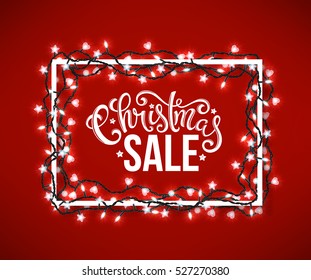 Christmas sale poster with hand-drawn lettering over wooden background with christmas lights, vector illustration