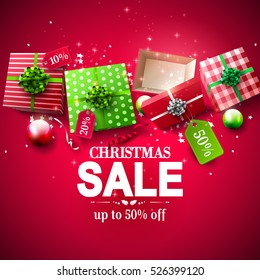 Christmas sale poster with red and green gift boxes with price tags 